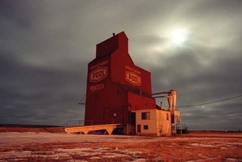 Night photograph of Wooden grain elevator at Ponteix, Saskatchewan