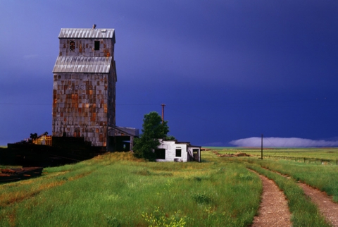 Wooden grain elevator at Collins, Montana entitled "After the Storm"