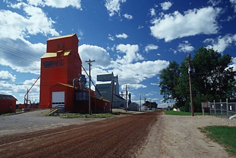 Photograph of wooden grain elevators at Nanton, Alberta