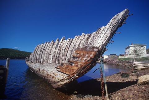 Photograph of wooden hull entitled "Grounded"