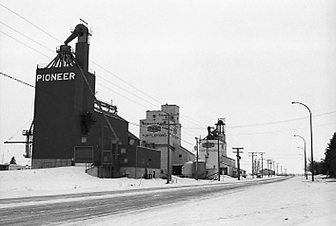 Photograph of wooden grain elevators at Turtleford, Saskatchewan