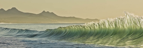 Panoramic photograph of waves, Mexico.  "Recoil"