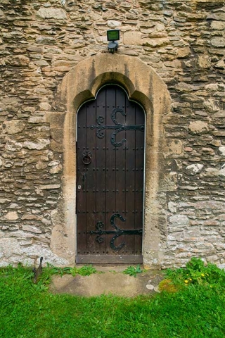 Photo of side door at St Mary the Virgin Church, Bampton, Oxfordshire, UK.